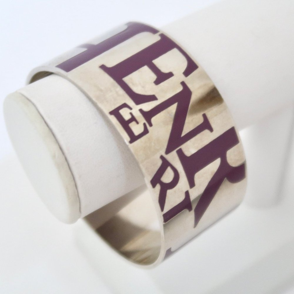 HENRI BENDEL wide enamel logo cuff